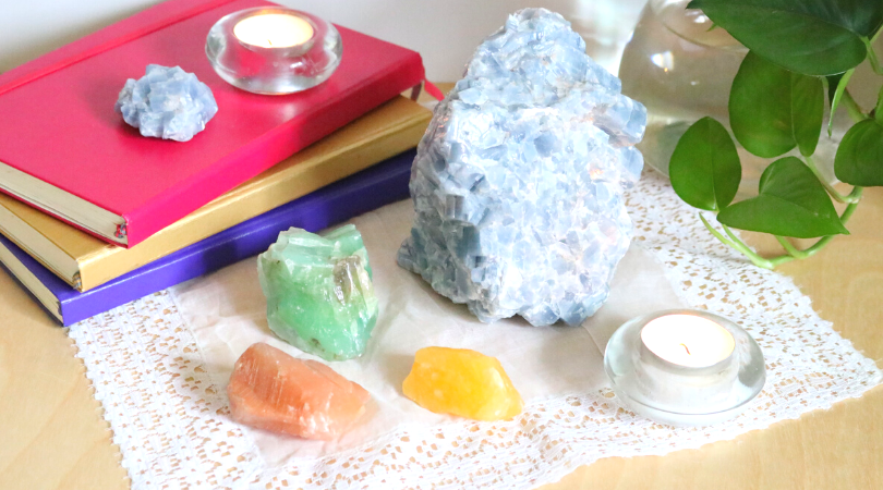 Calcite is a positive & motivating healing crystal! Learn all about the magic of calcite, as well as its magical color variations in this blog post. #calcite #healingcrystals #crystalhealer #learncrystalhealing #lovecrystals #crystallover #crystallove #healingcrystal #bluecalcite #orangecalcite #redcalcite #greencalcite