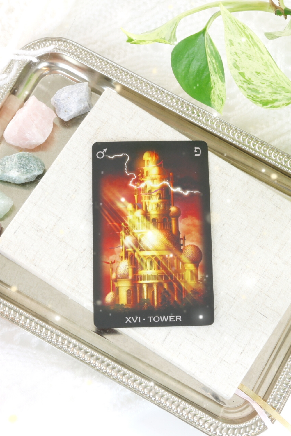 The Tower tarot card represents destruction for the sake of rebuilding. Something is no longer working and has to come crashing down.